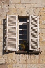 Fototapeta na wymiar French shutters and windows in Vieux Tours, France
