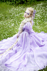 Fototapeta na wymiar princess in a daisy field