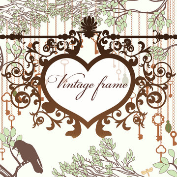 Vintage background with wrought heart frame and antique keys
