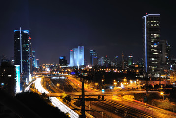 Fototapeta na wymiar Tel Aviv cityscape by night. Long shutter speed shot.