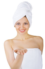 A beautiful girl wrapped in the bathtowel