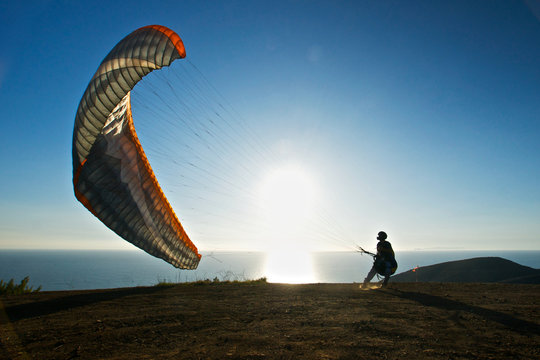 Paraglider Preps to Launch