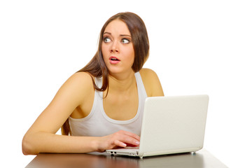 Naklejka premium Young girl with laptop