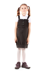 beautiful little girl in school uniform isolated on white