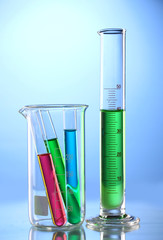 Laboratory glassware with color liquid and with reflection