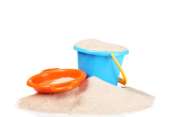 children's beach toys and sand isolated on white