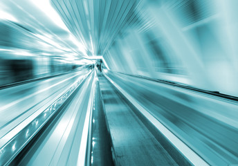 Fototapeta na wymiar Fast Metro escalator