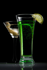 Martini cocktails with olive and lime