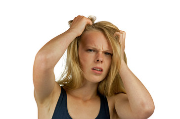 Fototapeta premium Young woman tearing her hair on white background