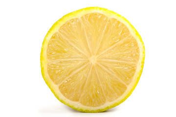 Single cross section of yellow lemon