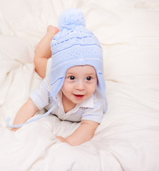 Cute little baby with blue hat