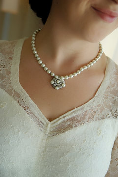 woman with pearl necklace