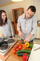 Young couple cooking