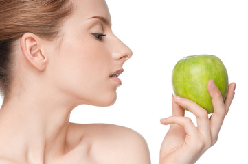 woman eat green apple