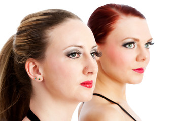 Two beautiful young dancers head shot isolated