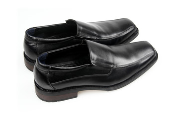 Black man's shoes on a white background.