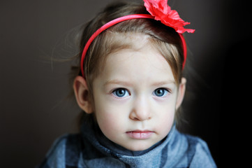 Portrait of adorable baby with flower headband