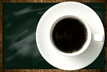 Coffee cup on blackboard background