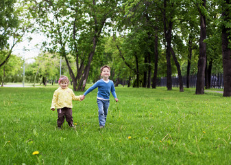 Fototapeta premium happy sister and brother outdoors