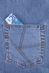 Twenty euro banknote in the jeans pocket