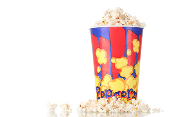 Full bucket of popcorn isolated on white © Africa Studio