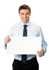 Businessman showing signboard, on white