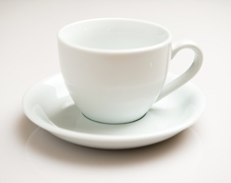 Coffee cup over white background