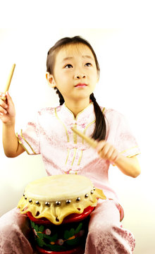 Asian Girl Playing Drum