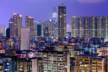Fototapeta na wymiar crowded building at night in Hong Kong