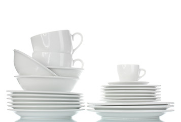 empty bowls, plates and cups isolated on white