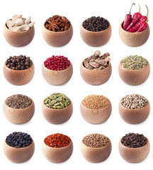 set of wooden bowls full of different spices © andriigorulko