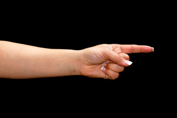 Female hand with pointing finger over black background
