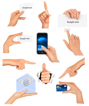 Set of hands holding different business objects.