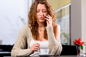 young woman is talking phone