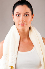 sporty woman with towel