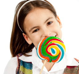Fototapeta na wymiar little girl with lollipop isolated on white