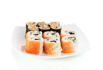 Tasty rolls served on white plate isolated on white