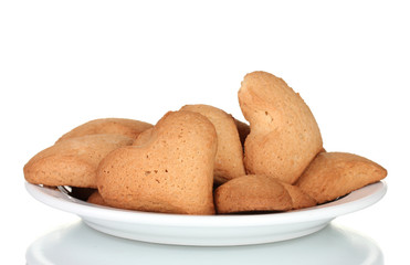 Heart-shaped cookies on white plate isolated on white