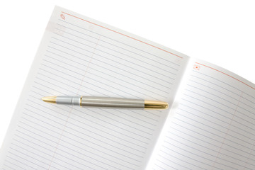 ink pen and notebook