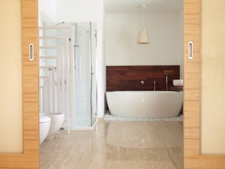 Fototapeta na wymiar En suite bathroom with freestanding bath