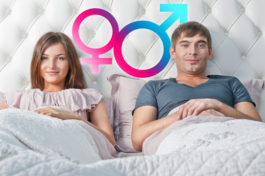 Young Couple Lying In Their Bed Thinking About Something. Gender