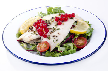 fresh fried plaice with fresh salad and tomatoes