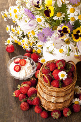 strawberries and bouquet of flowers