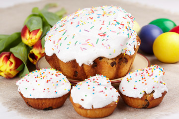 Easter cakes, painted eggs and tulips