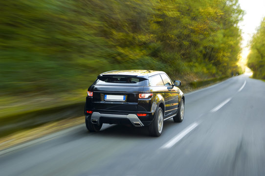 Fototapeta car driving fast