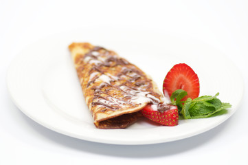 Pancakes with strawberry and leaflets Mints