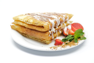 Pancakes with strawberry and leaflets Mints