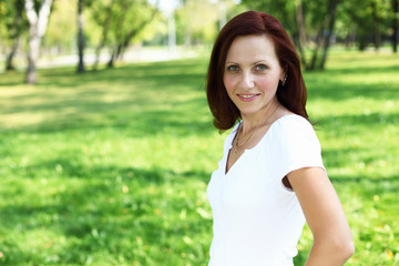 Young woman in summer park