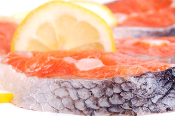 Fresh salmon and lemon closeup
