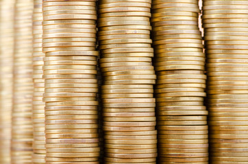 Golden coins in high stacks